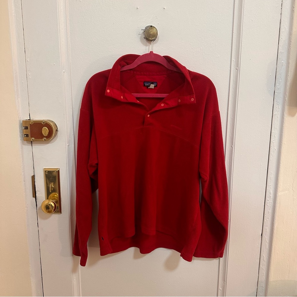 Vintage Patagonia fleece quarter snap henley with small hole on the side